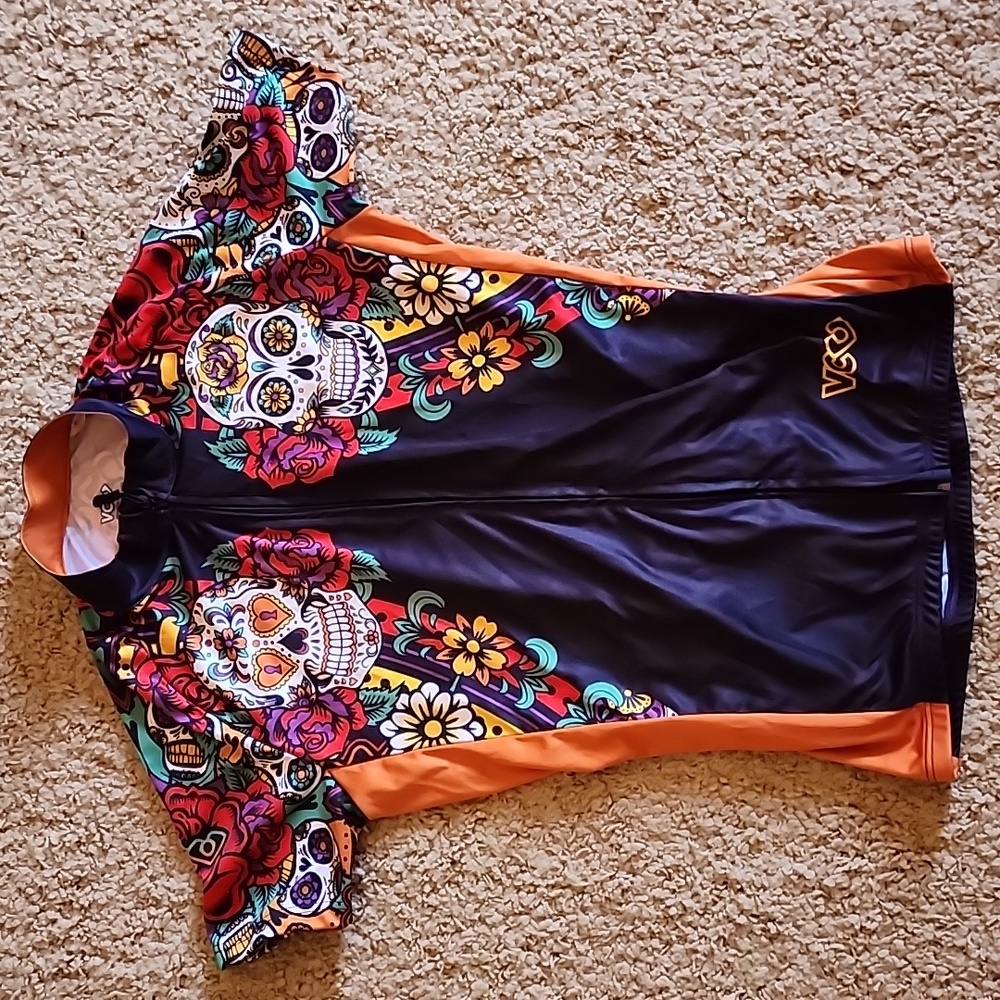 FIVE bike jerseys